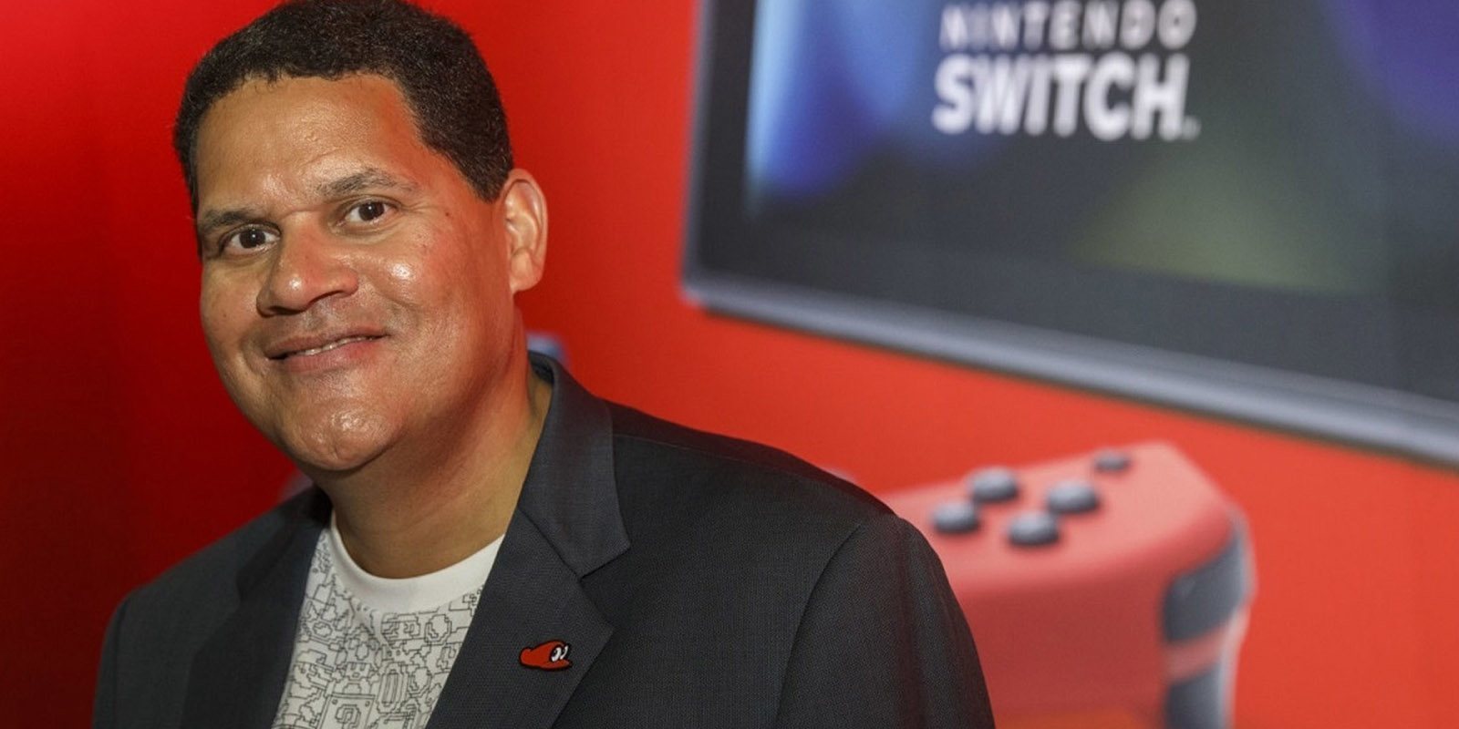 Phil Spencer y Shawn Layden felicitan a Reggie Fils-Aime por su labor